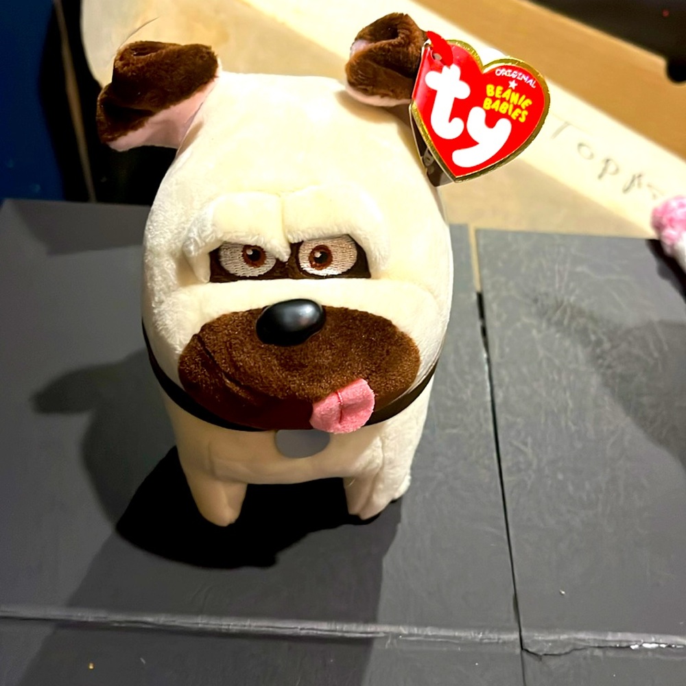 1 “Mel” TY beanie baby dog.